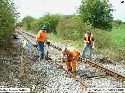 Sat 30th April 2005. As with all preserved railways you do come accross the odd rotten sleeper - then you call the A team , or in this case the ESR pway gang - and as quick as lightening they're at it as can be seen in this picture. Terry, Ralph and Pat.